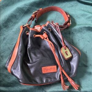 Elegant Dooney & Bourke Black Leather Drawstring Bucket Bag with Brown Trim